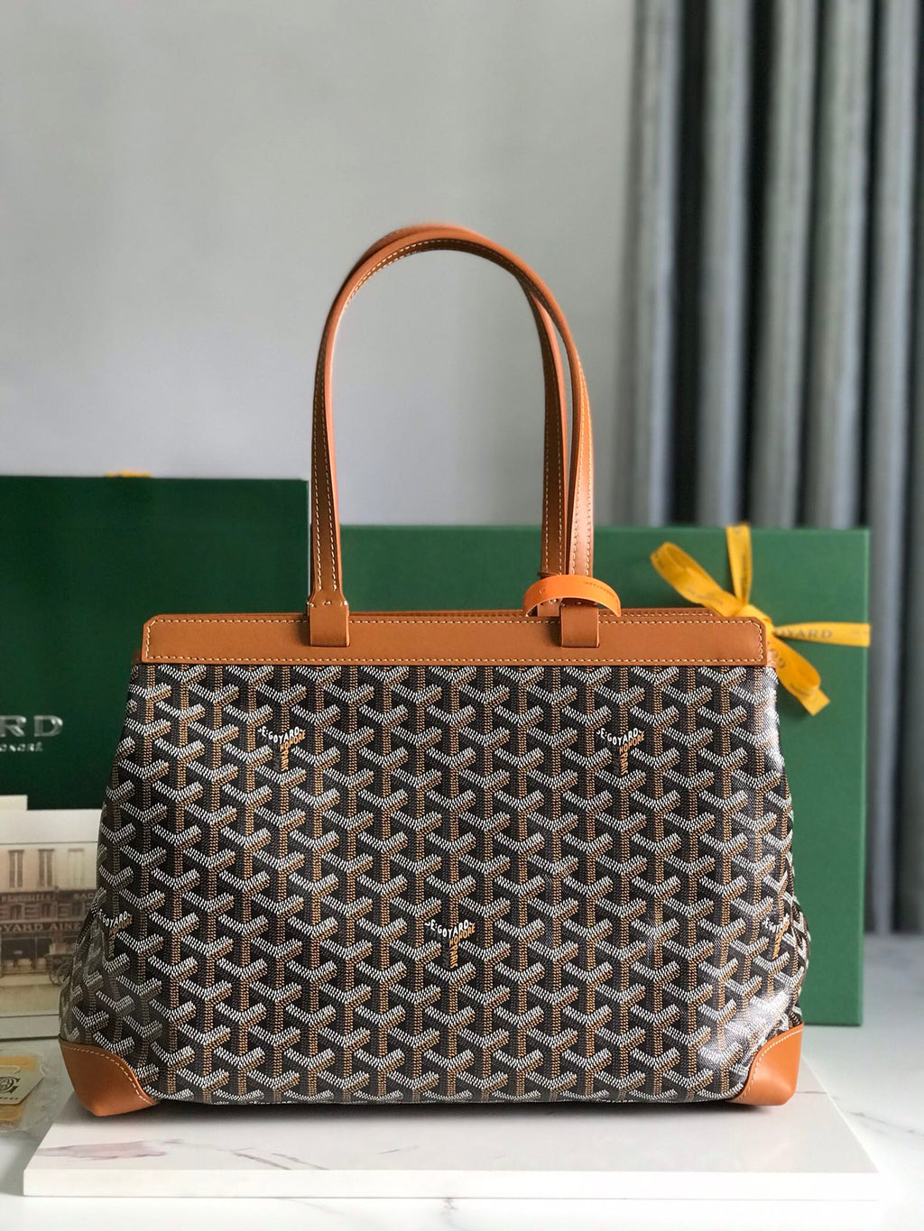 BELLECHASSE BIAUDE PM BAG 36 IN BLACK GOYARDINE CANVAS AND TAN CALFSKIN TRIM