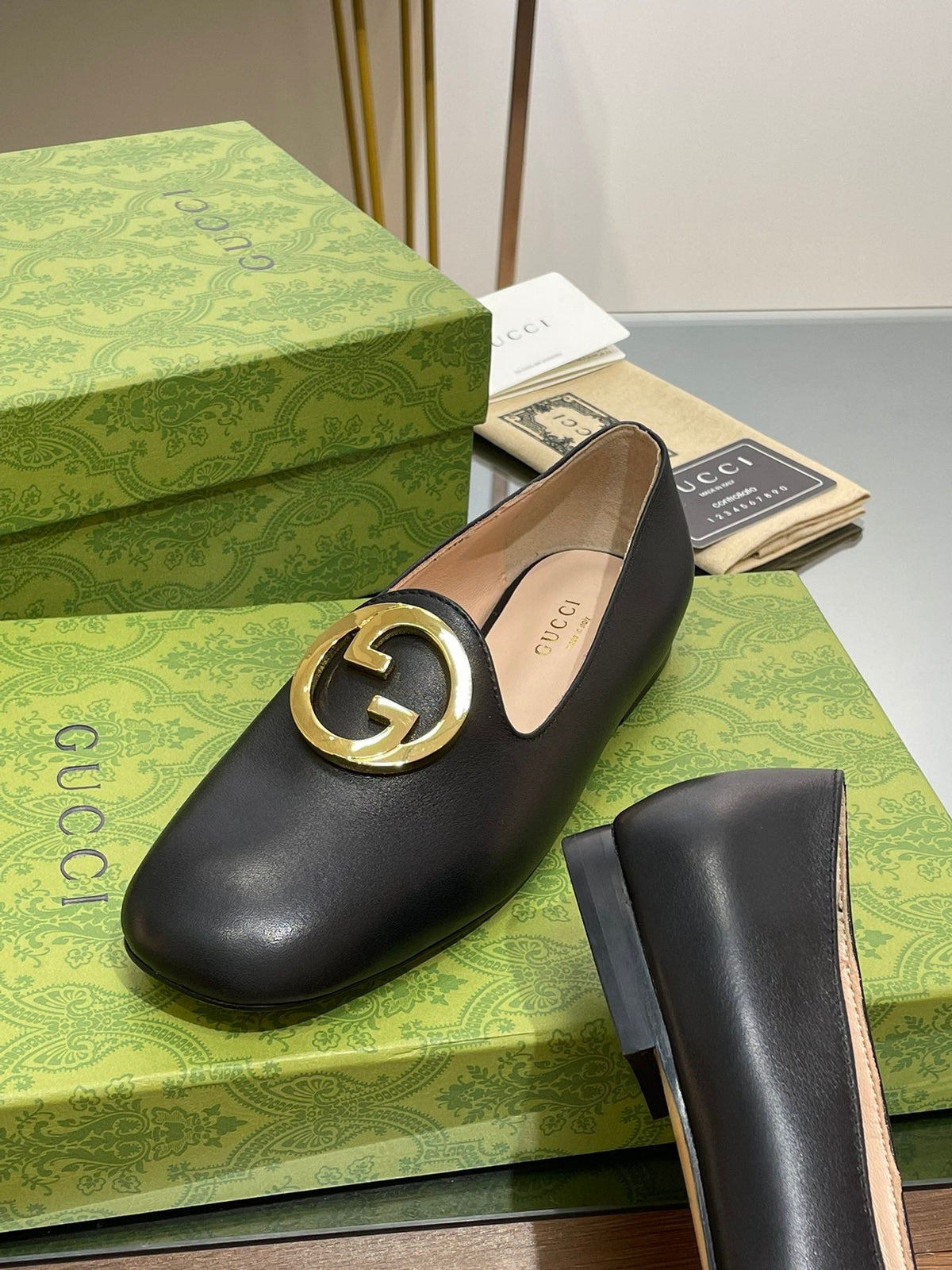 BLONDIE LOGO-PLAQUE LOAFERS IN BLACK CALFSKIN