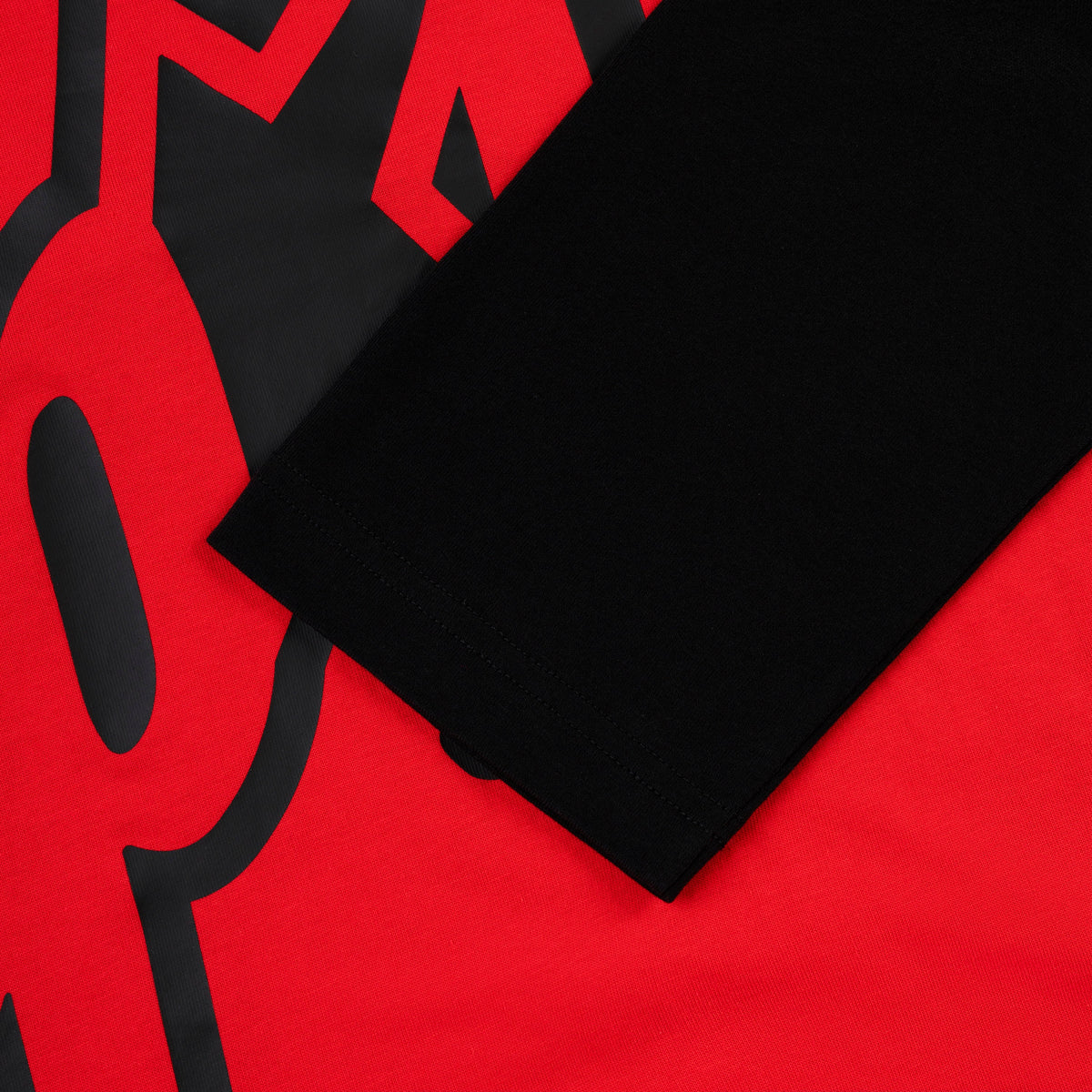 RALLY RAGLAN LONGSLEEVE