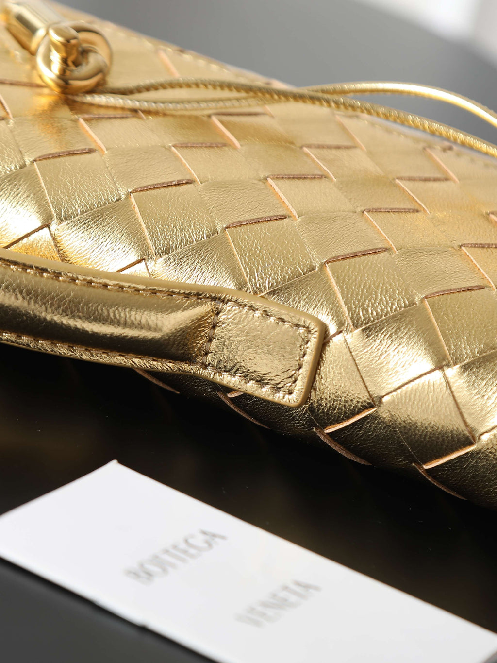 Andiamo Clutch 31cm Gold Intrecciato Leather