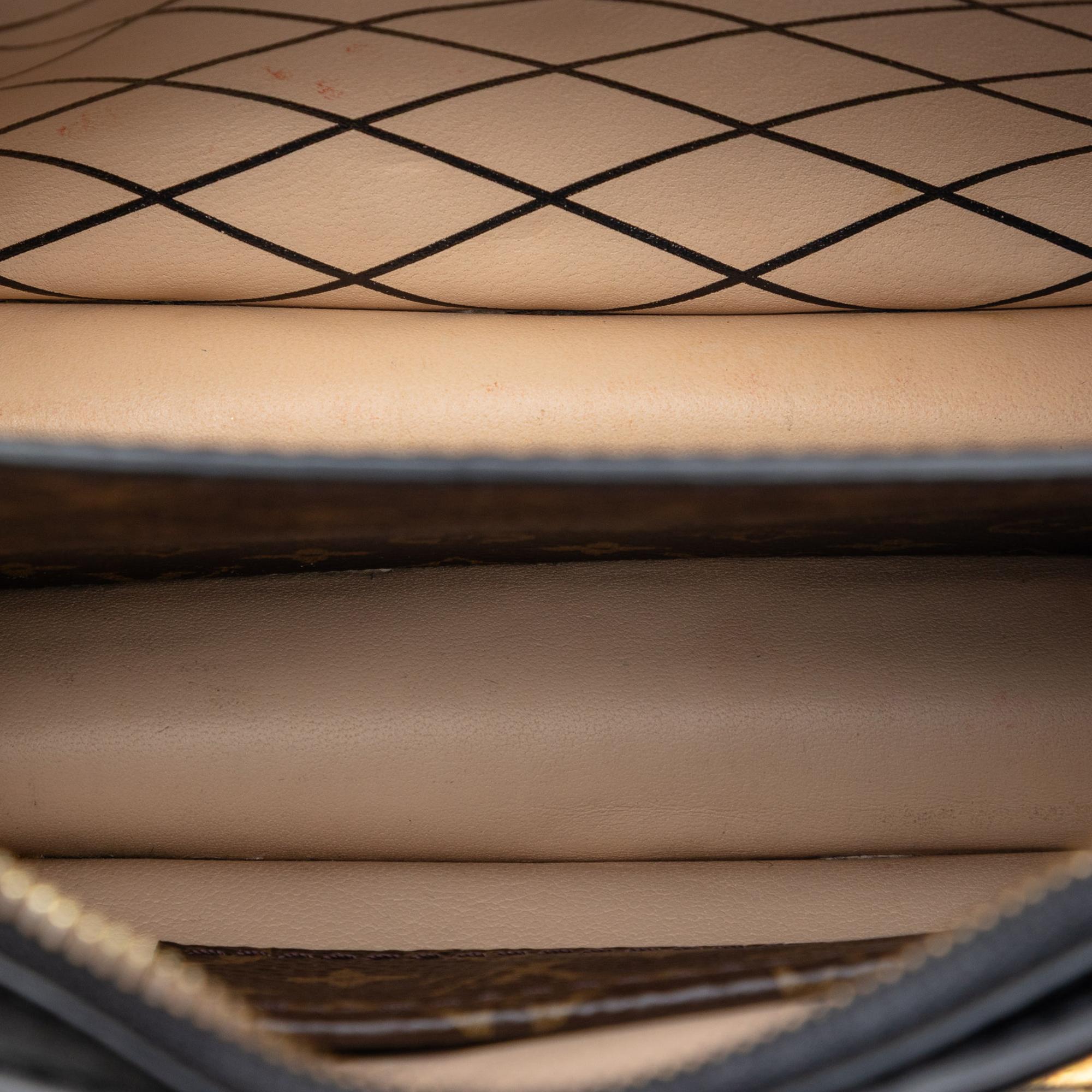 Louis Vuitton Monogram Reverse Trunk Clutch
