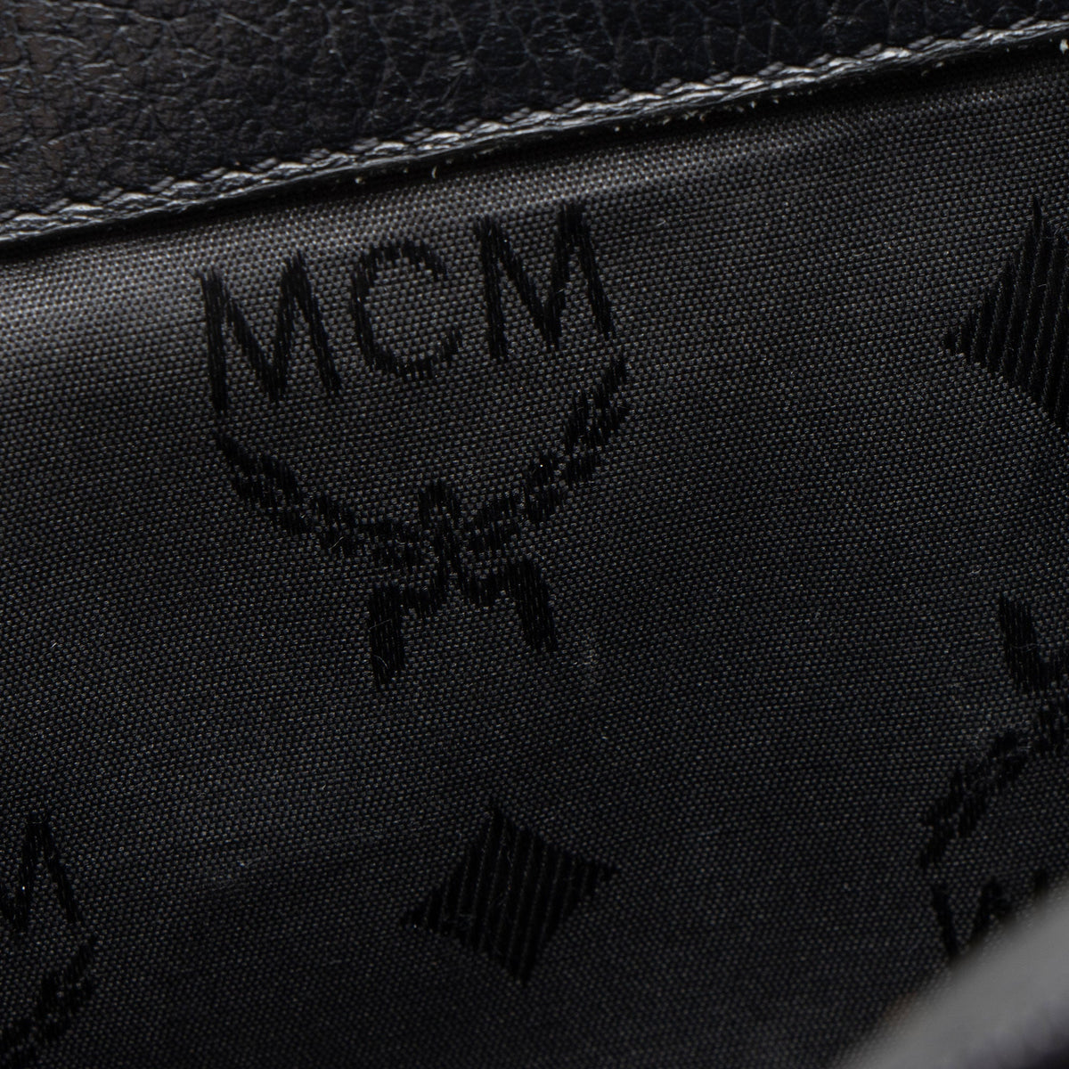 MCM Vintage Leather Logo Charms Drawstring Backpack