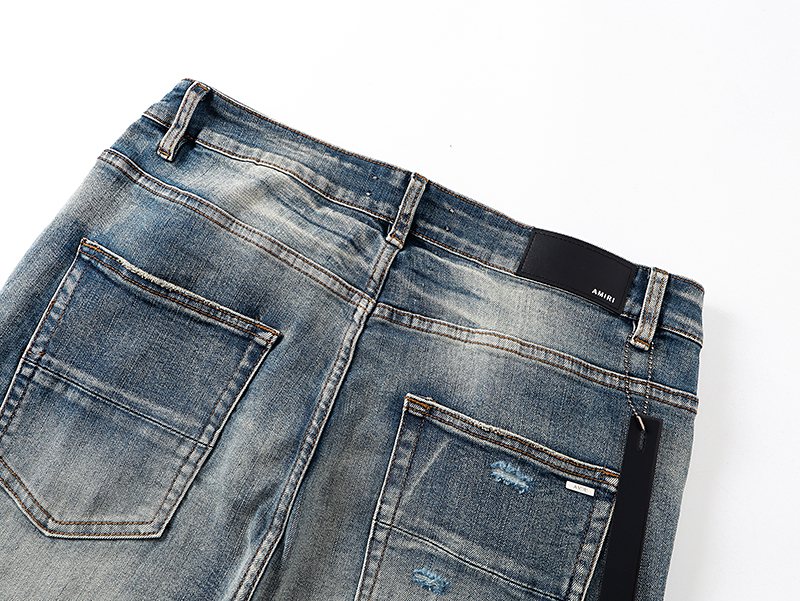 AMIRI Light Blue Distressed Appliqué Jeans