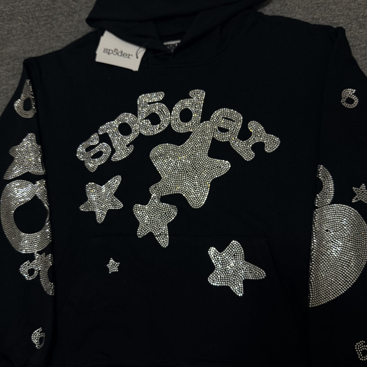 Sp5der Silver Rhinestone-Style Graphic Hoodie