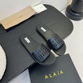 Alaia women laser-cut black leather slide 235539