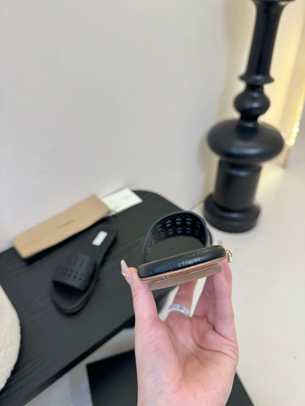 Alaia women laser-cut black leather slide 235539