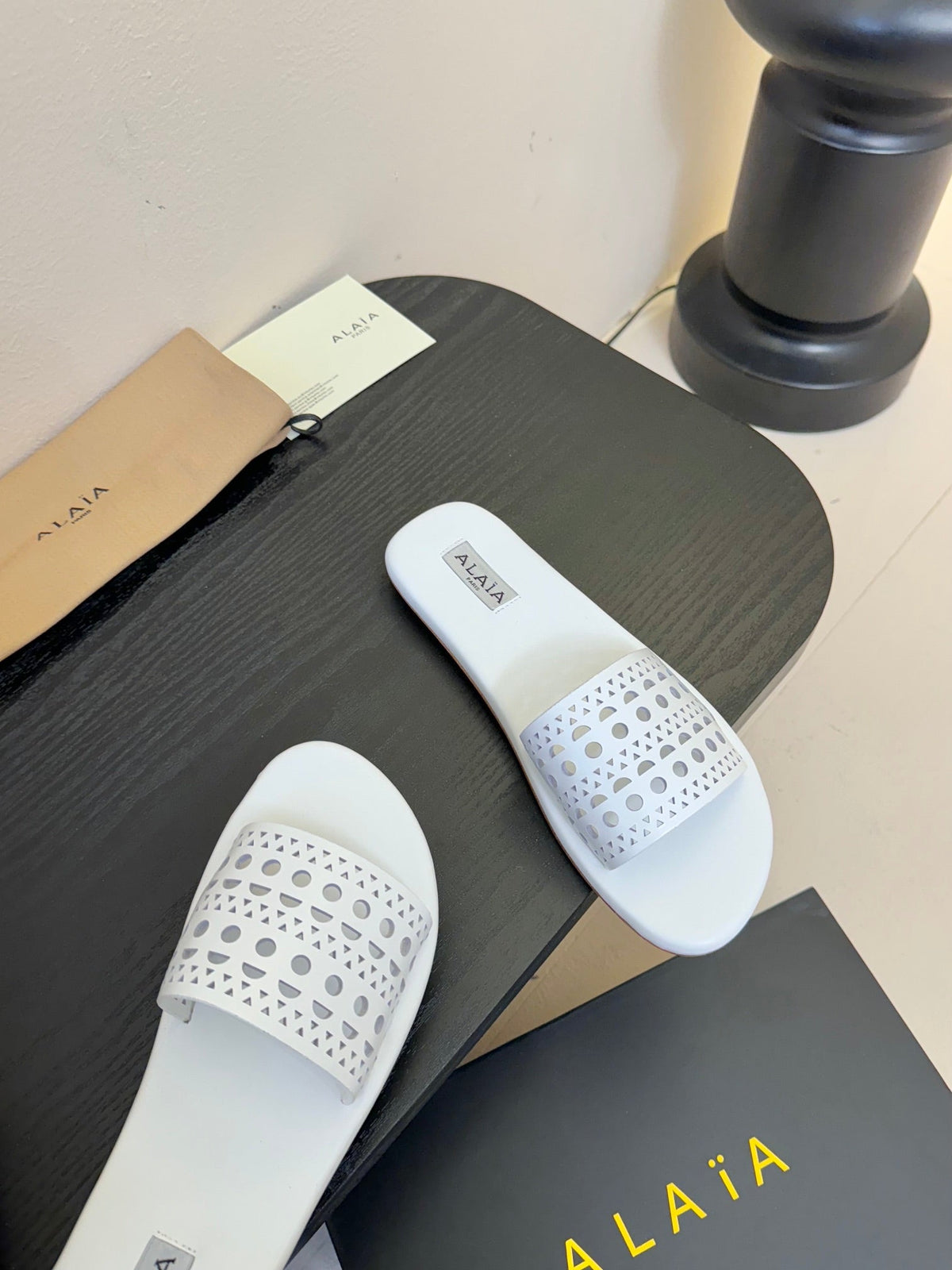 Alaia women laser-cut white leather slide 235540