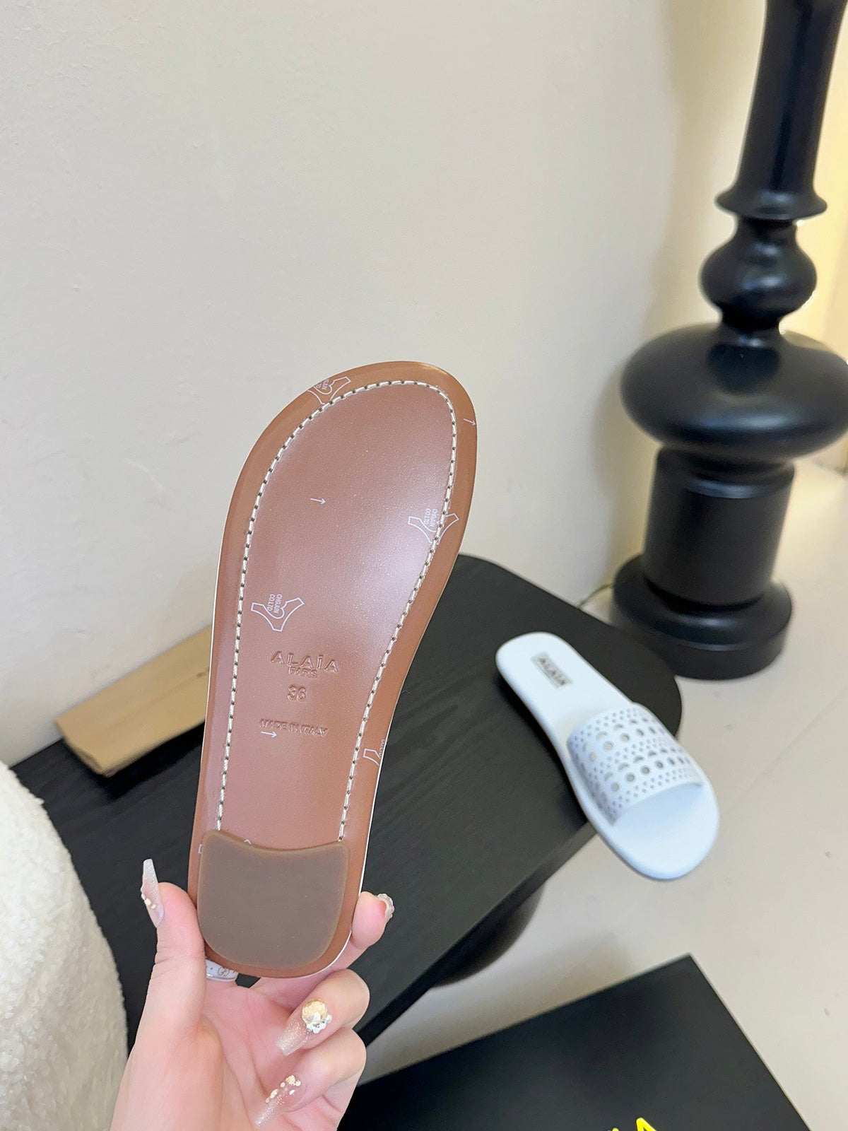 Alaia women laser-cut white leather slide 235540