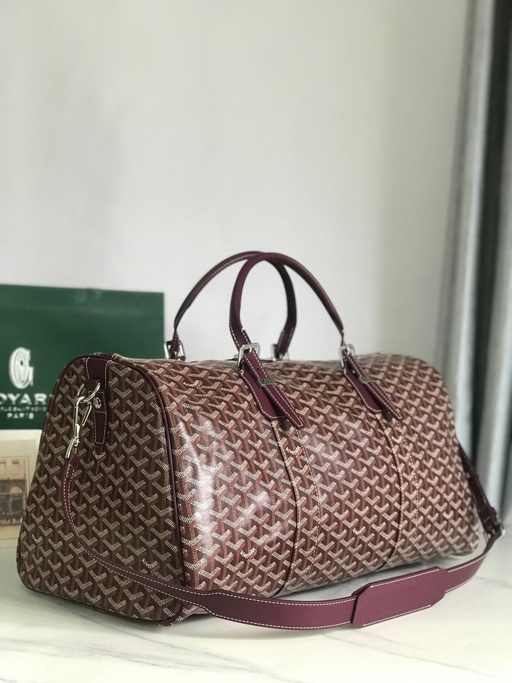 BOSTON 50 BAG IN WINE RED GOYARDINE CANVAS AND CALFSKIN TRIM